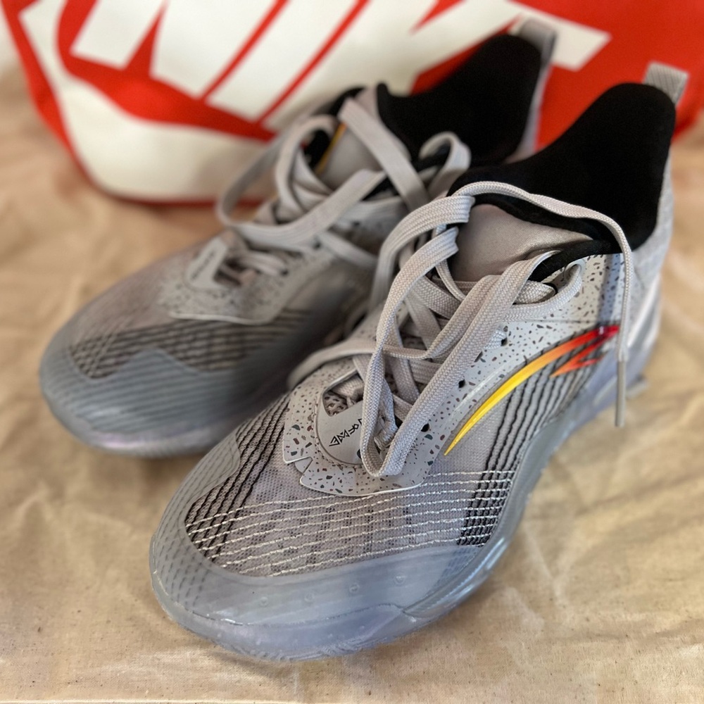 Nike Kids Sneakers in Gray with Red and Yellow Accents